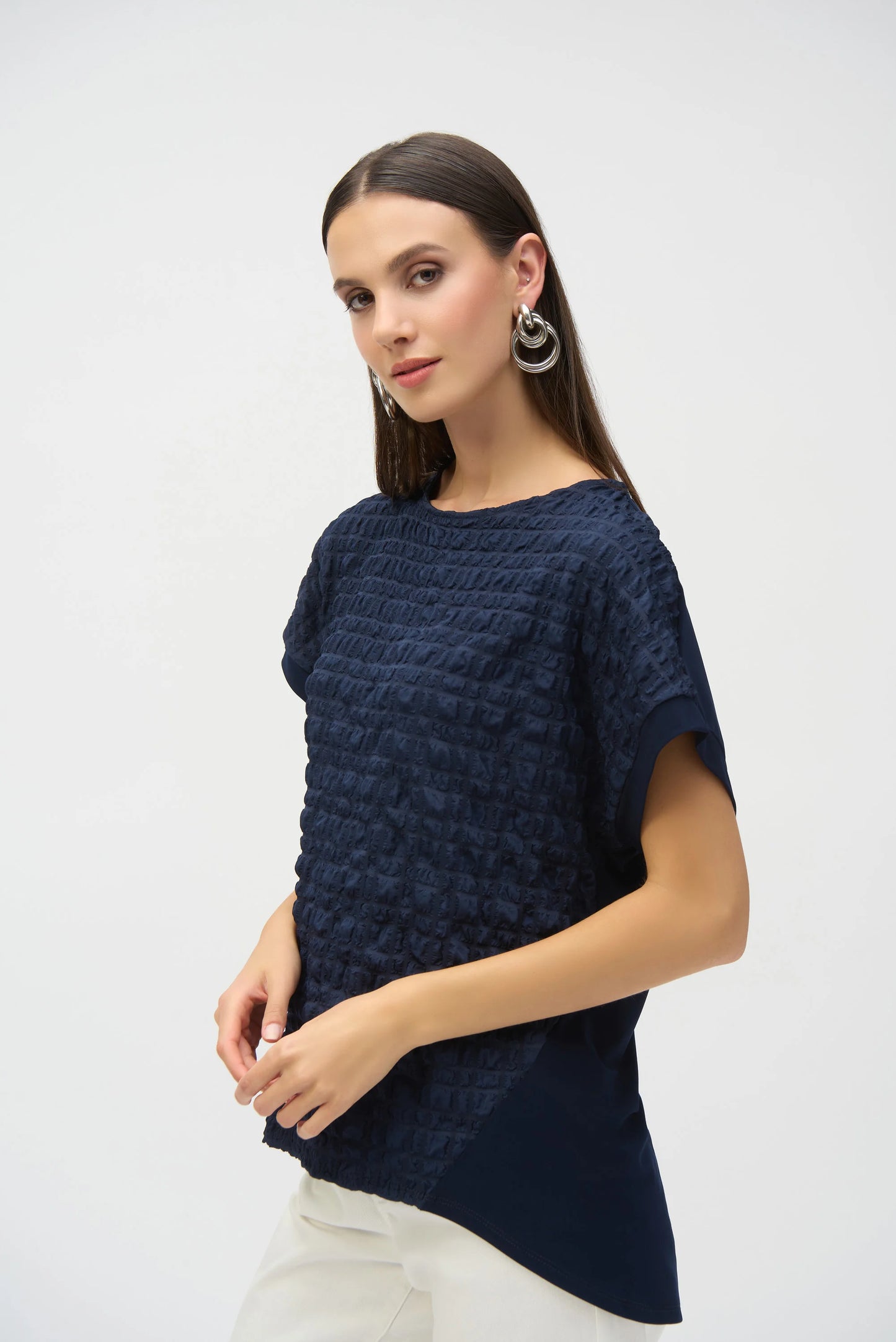 Bubble Jacquard & Silky Knit High Low Top. Style JR252213