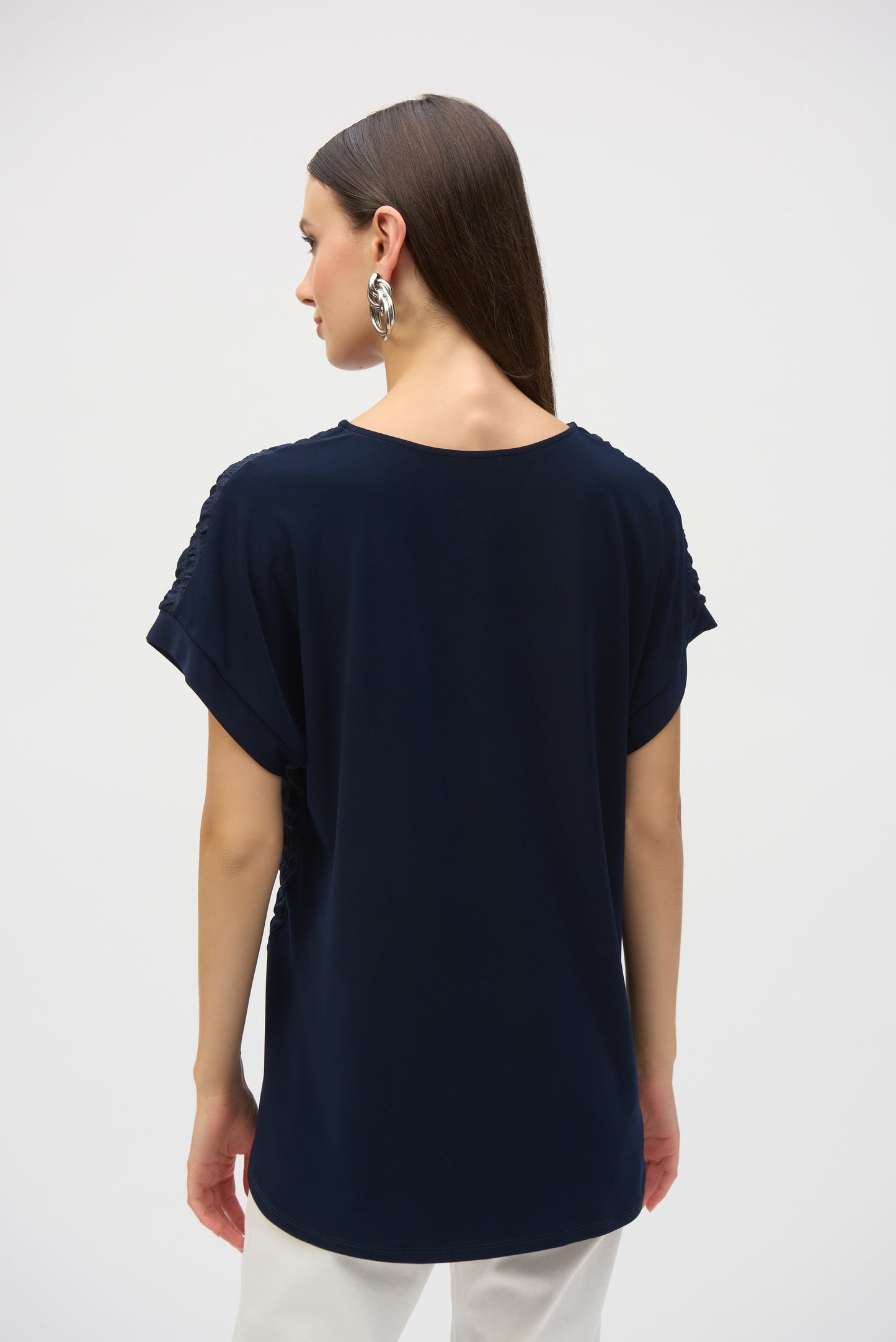 Bubble Jacquard & Silky Knit High Low Top. Style JR252213