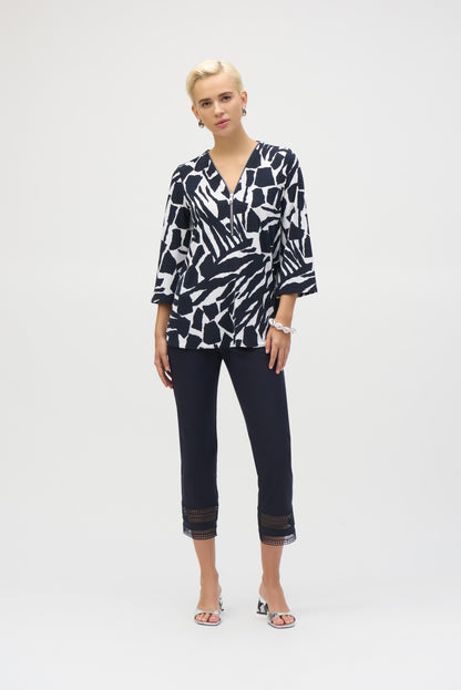 Silky Knit 1/4 Rhinestone Zip Top. Style JR252157