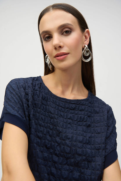 Bubble Jacquard & Silky Knit High Low Top. Style JR252213