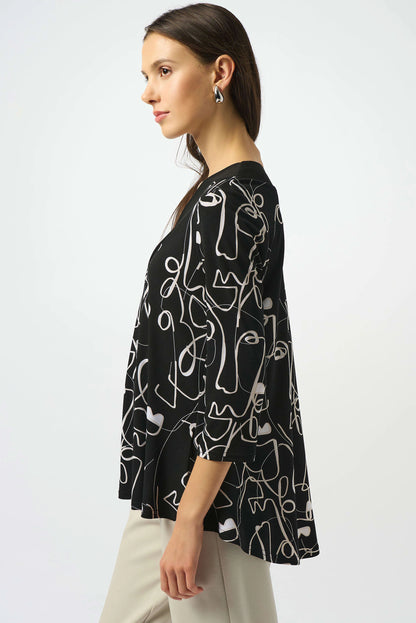 Silky Knit Face Print Flared Top. Style JR253138
