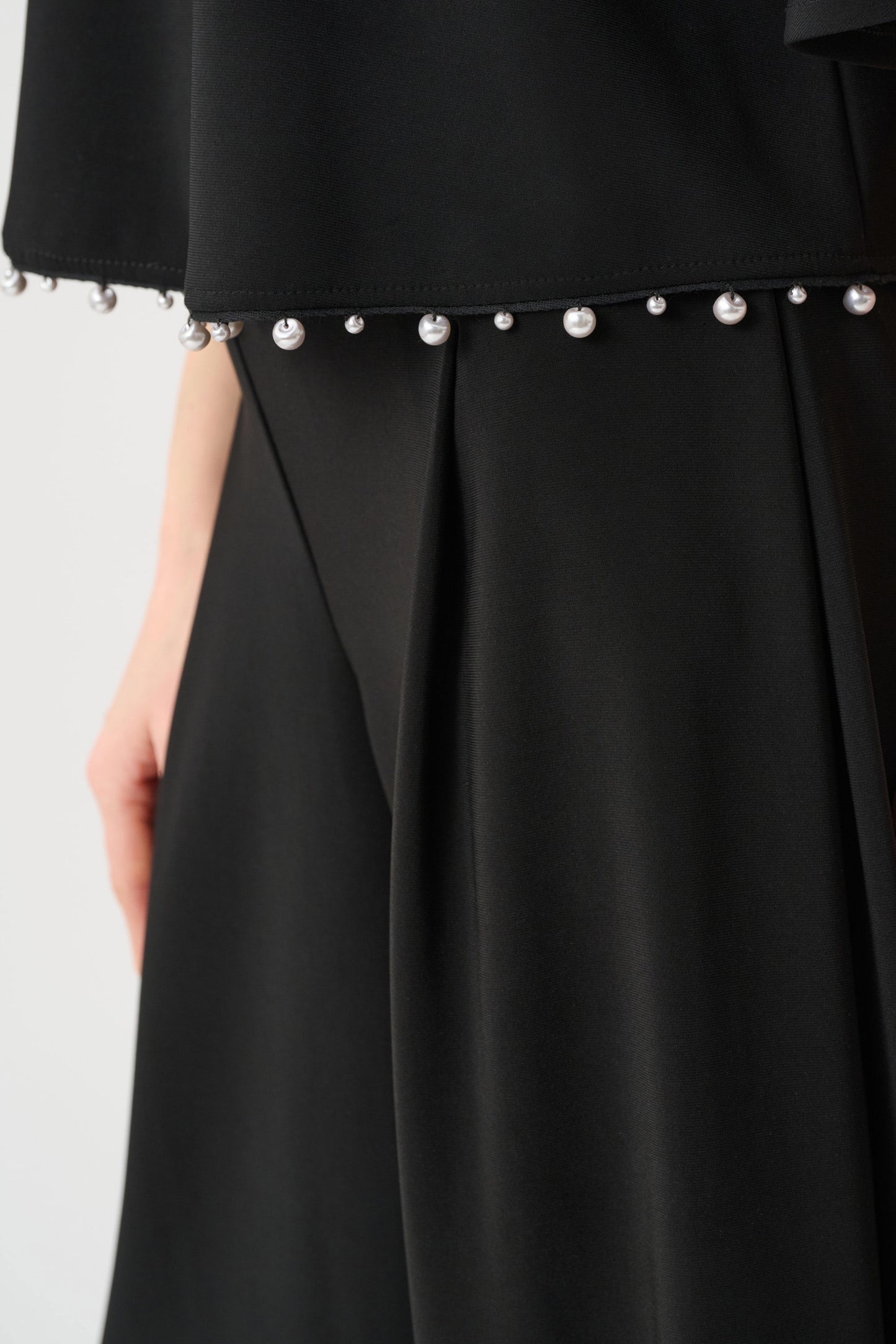 Silky Knit Flared Pearl Detail Top. Style JR263116