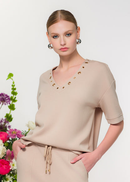Grommet Detailing Short Sleeve Stretch Sweater. Style EW36042