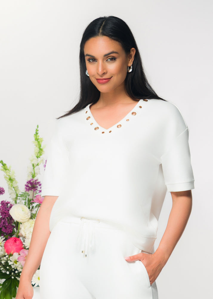 Grommet Detailing Short Sleeve Stretch Sweater. Style EW36042